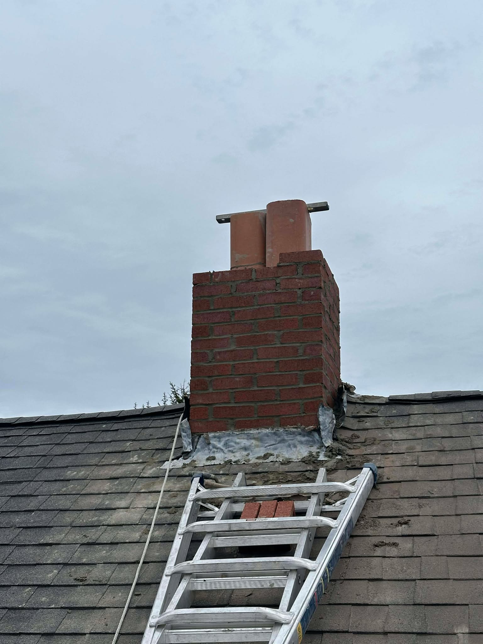 Professional tuckpointing chimney repair in Quincy MA by Elite Chimney