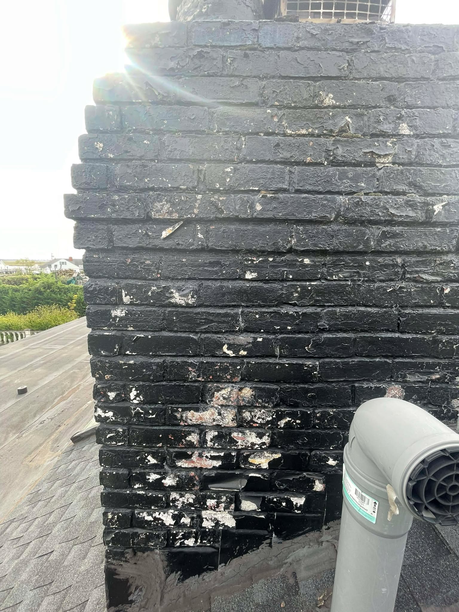 Before and after chimney work in Newton MA by Elite Chimney