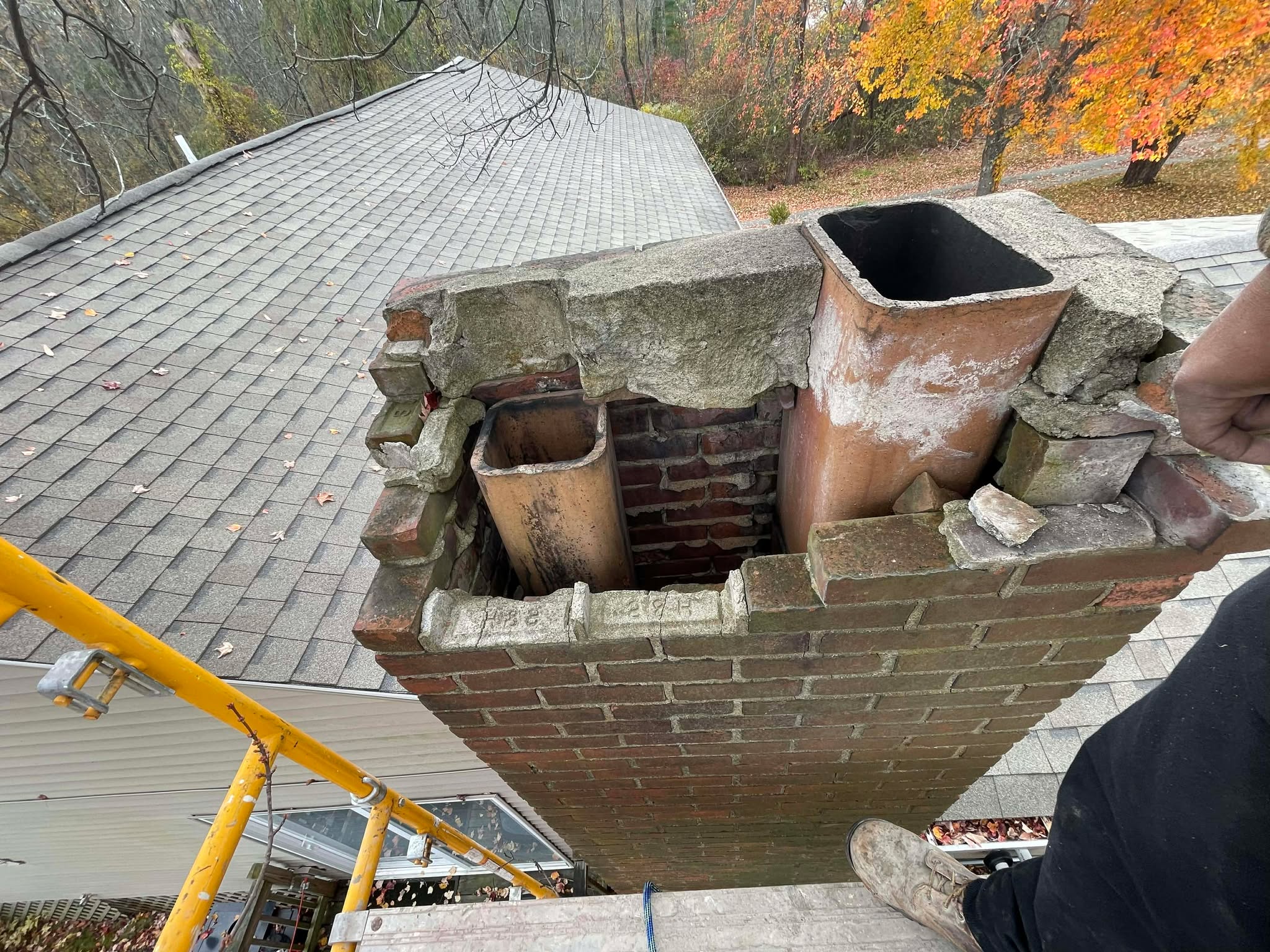 Chimney sweeping service in Newton MA by Elite Chimney