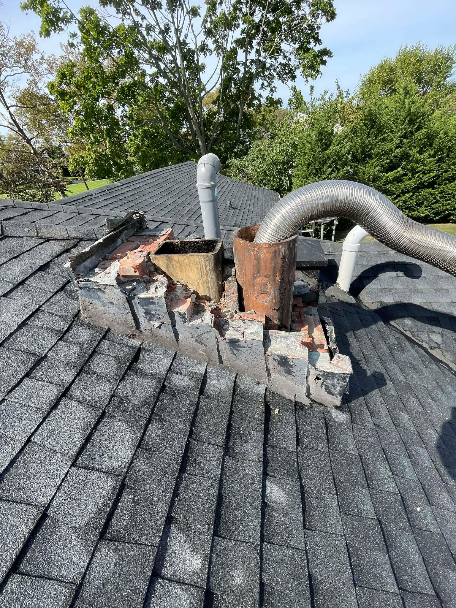 Chimney tuckpointing project in Braintree MA by Elite Chimney